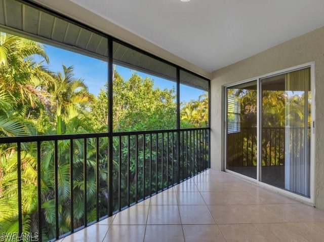 unfurnished sunroom featuring plenty of natural light