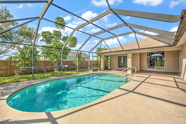 view of pool featuring a lanai and a patio area