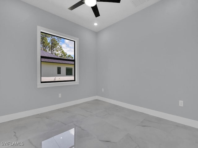 unfurnished room with ceiling fan