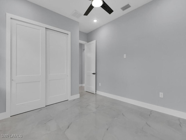 unfurnished bedroom with a closet and ceiling fan