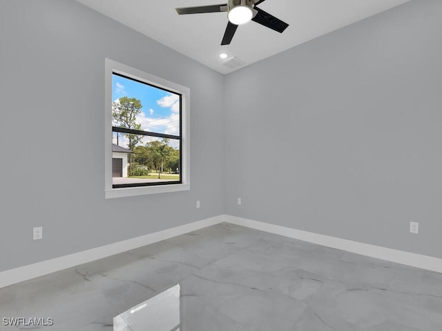 unfurnished room featuring ceiling fan