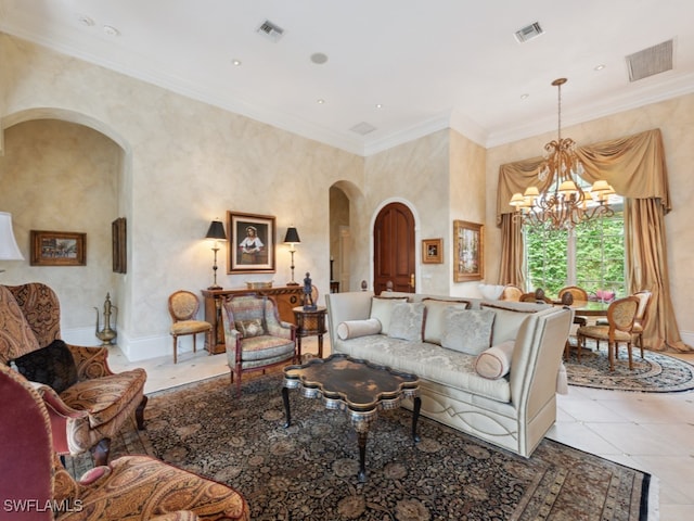 living room featuring light tile patterned floors, ornamental molding, and a notable chandelier