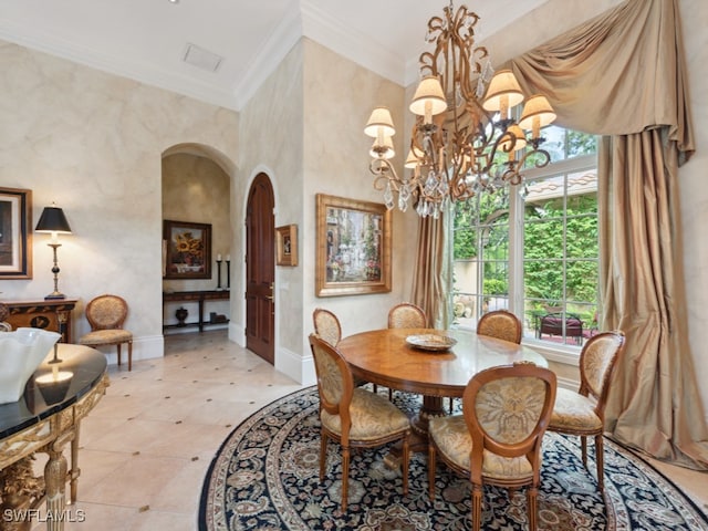 dining area with a notable chandelier and ornamental molding