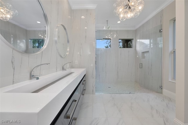 bathroom featuring ornamental molding, a shower with door, a chandelier, and vanity