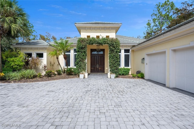 property entrance with a garage