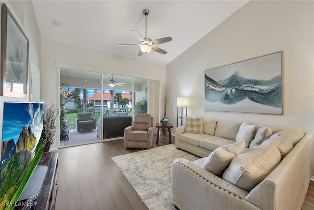 living room with dark hardwood / wood-style floors, ceiling fan, high vaulted ceiling, and a wealth of natural light