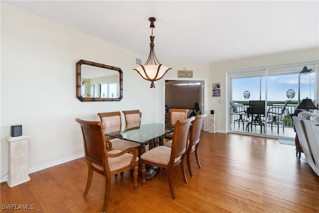 dining area featuring hardwood / wood-style floors