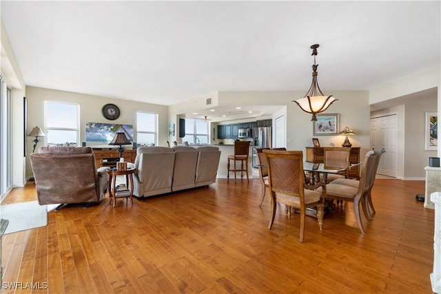 dining room featuring light wood-type flooring