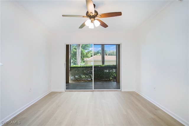 unfurnished room featuring light hardwood / wood-style floors, ornamental molding, and ceiling fan