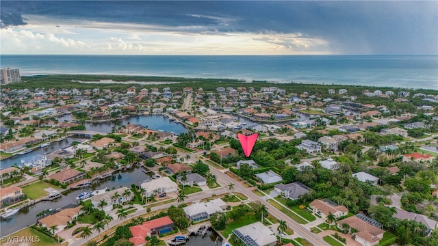 drone / aerial view featuring a water view