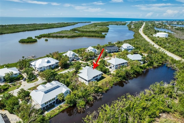 drone / aerial view with a water view