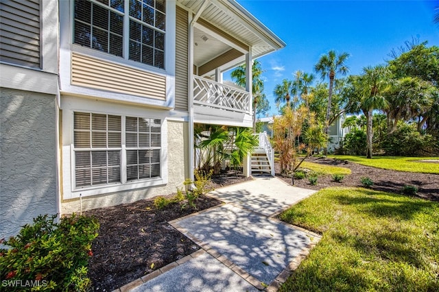 view of home's exterior with a yard