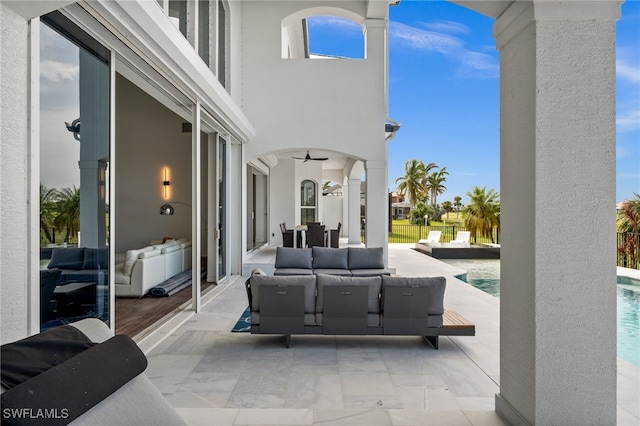 view of patio / terrace with an outdoor hangout area and ceiling fan