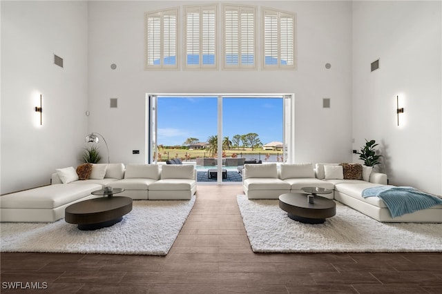 living room with a high ceiling