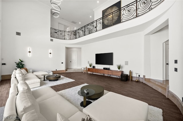 living room featuring a high ceiling