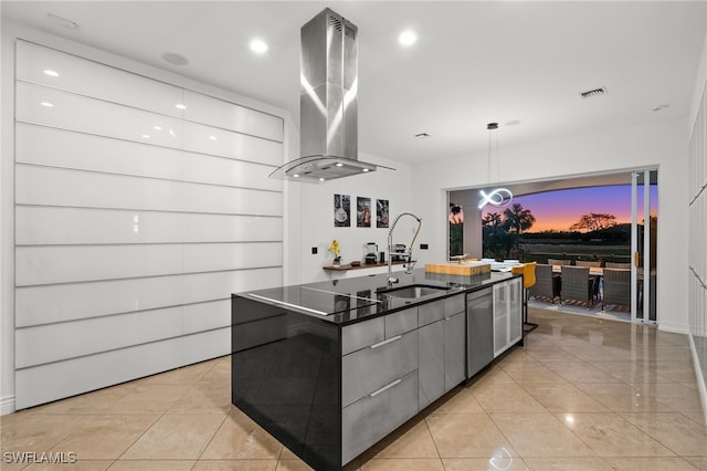 kitchen featuring a spacious island, light tile patterned flooring, sink, island range hood, and pendant lighting