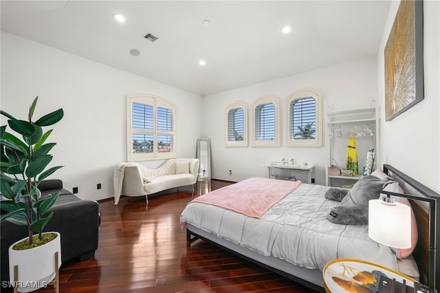 bedroom featuring dark wood-type flooring