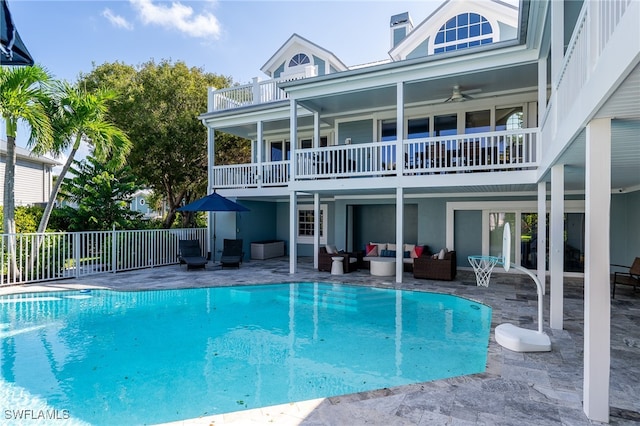 view of swimming pool with an outdoor hangout area, a patio, and ceiling fan