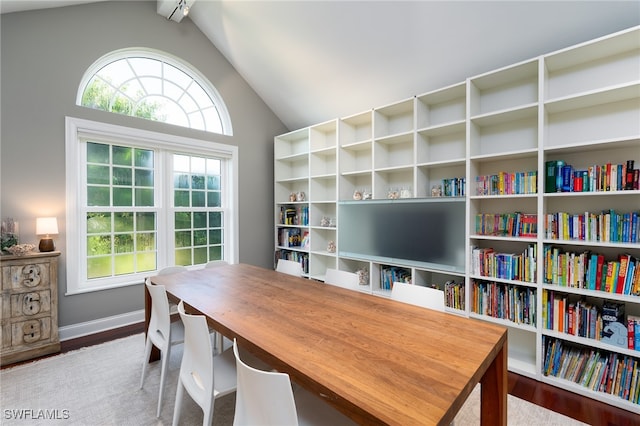 office space with hardwood / wood-style floors and vaulted ceiling