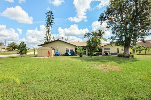 view of yard with a storage unit