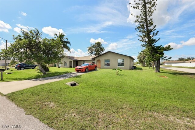 view of front of house with a front yard