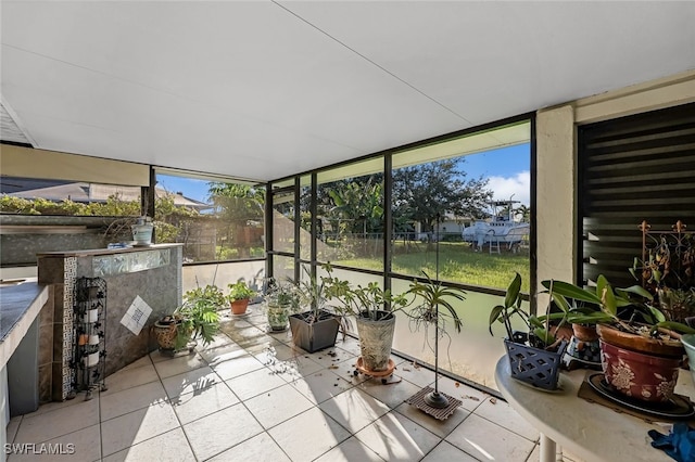 sunroom / solarium featuring plenty of natural light