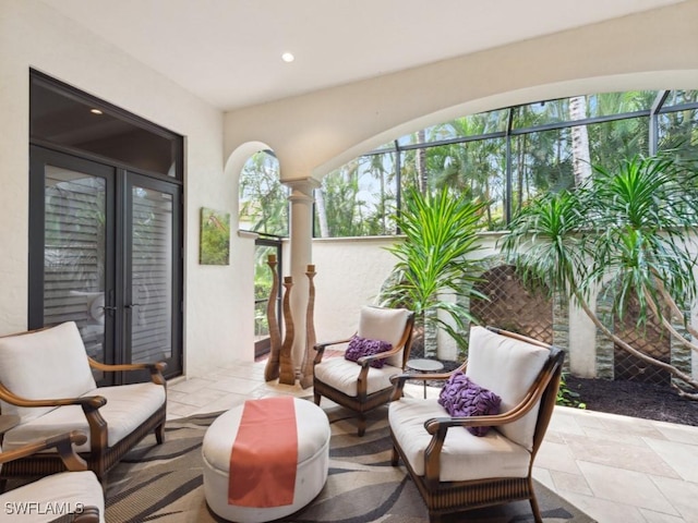 15183 Brolio Way, Naples, FL 34110 - view of patio with an outdoor living space