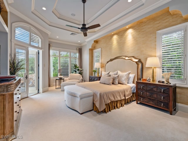 bedroom featuring ornamental molding, multiple windows, light colored carpet, and access to exterior