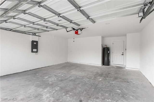 garage featuring a garage door opener, water heater, and electric panel