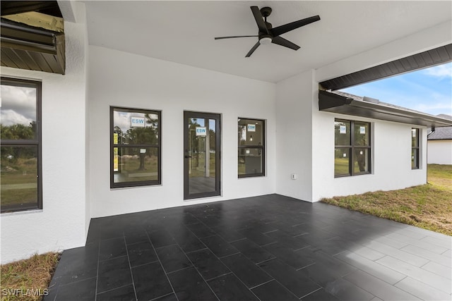 view of patio with ceiling fan