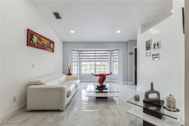 living room with lofted ceiling