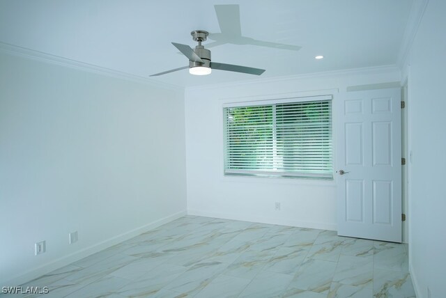 empty room with crown molding and ceiling fan