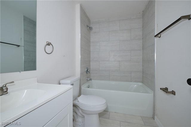 full bathroom featuring vanity, toilet, and tiled shower / bath combo