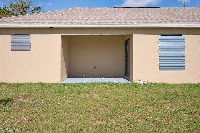 exterior space with a yard