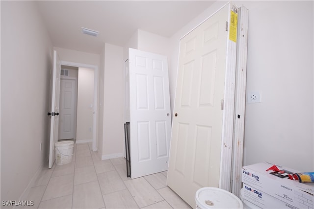 bathroom featuring tile patterned flooring