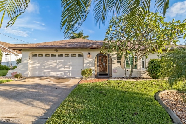 ranch-style house with a front yard and a garage