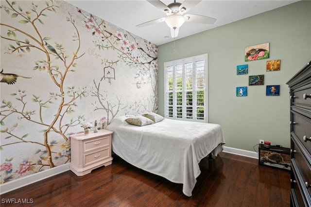 bedroom featuring hardwood / wood-style flooring and ceiling fan