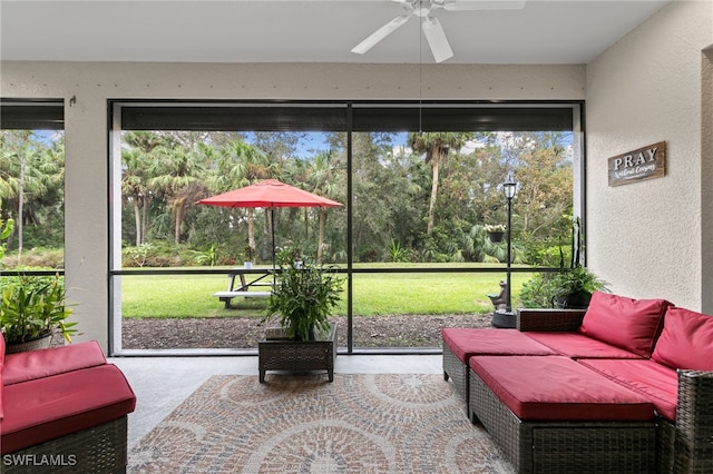 sunroom / solarium with ceiling fan