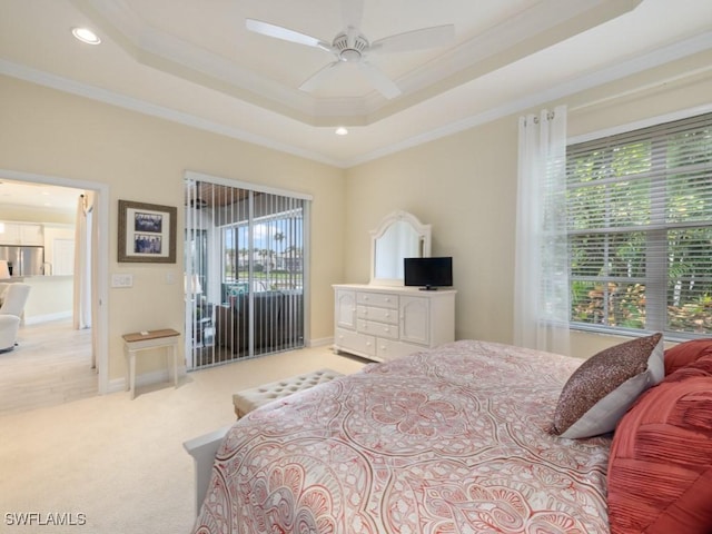 bedroom with light carpet, stainless steel fridge, multiple windows, and ceiling fan