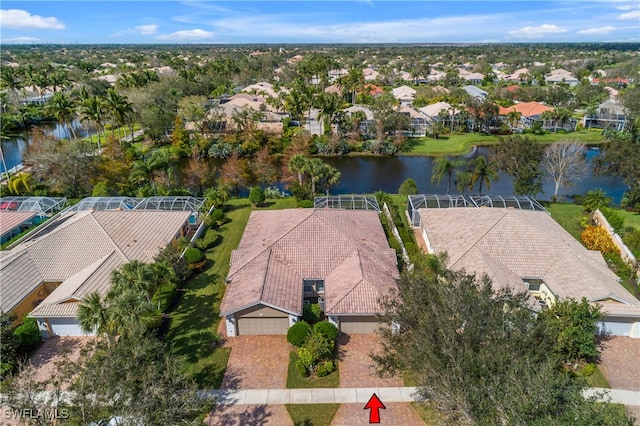 aerial view with a water view and a residential view