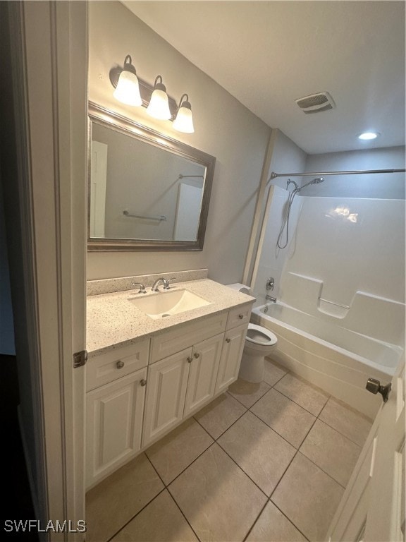 full bathroom with  shower combination, vanity, toilet, and tile patterned floors