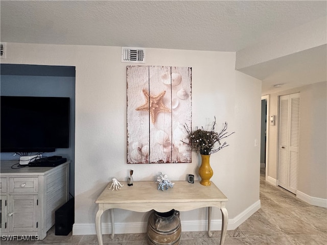 details featuring a textured ceiling