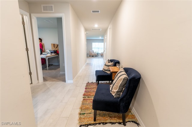 corridor featuring light hardwood / wood-style flooring