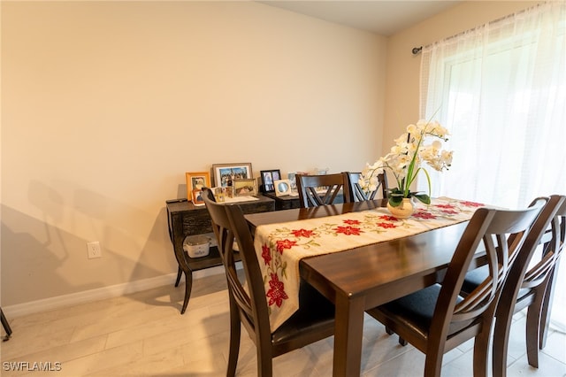 dining area featuring hardwood / wood-style flooring