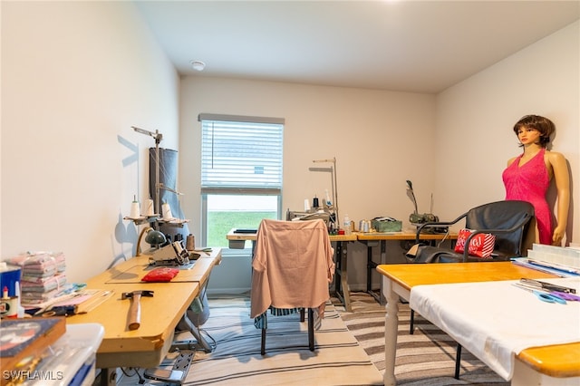 office area featuring light colored carpet