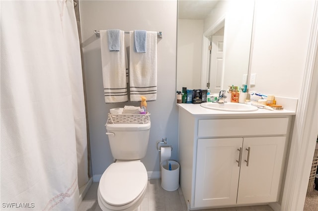 bathroom with vanity, walk in shower, and toilet