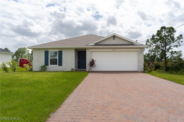 single story home featuring a front yard and a garage