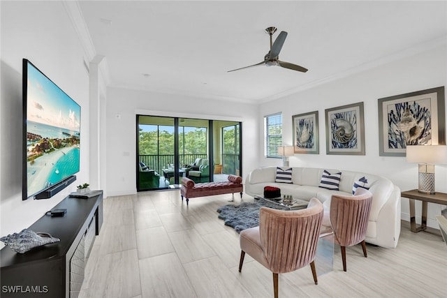 living room featuring ceiling fan and ornamental molding