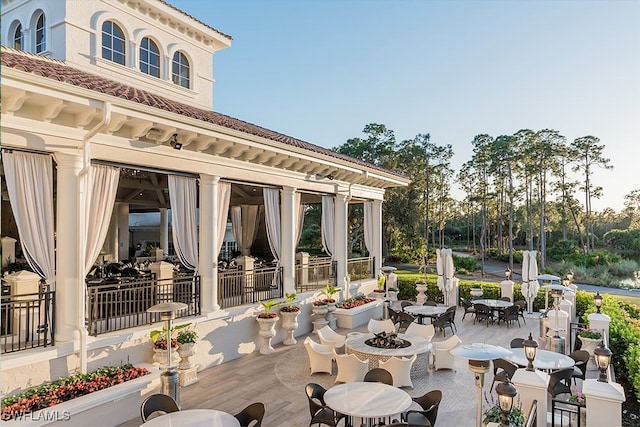 view of patio with an outdoor fire pit