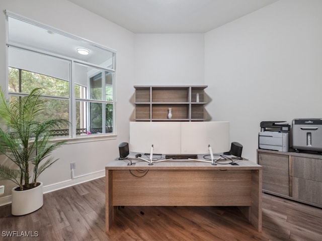 office area featuring dark wood-type flooring